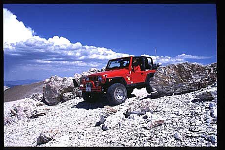 Jeep on top of Sweetwater Mountains in "squeeze rocks"
